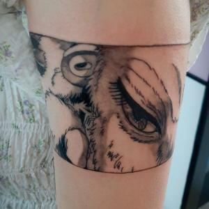 Tatouage bras loup Guibli 