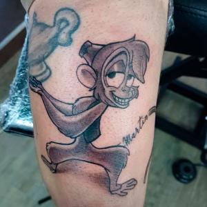 Tatouage bras singe Aladin